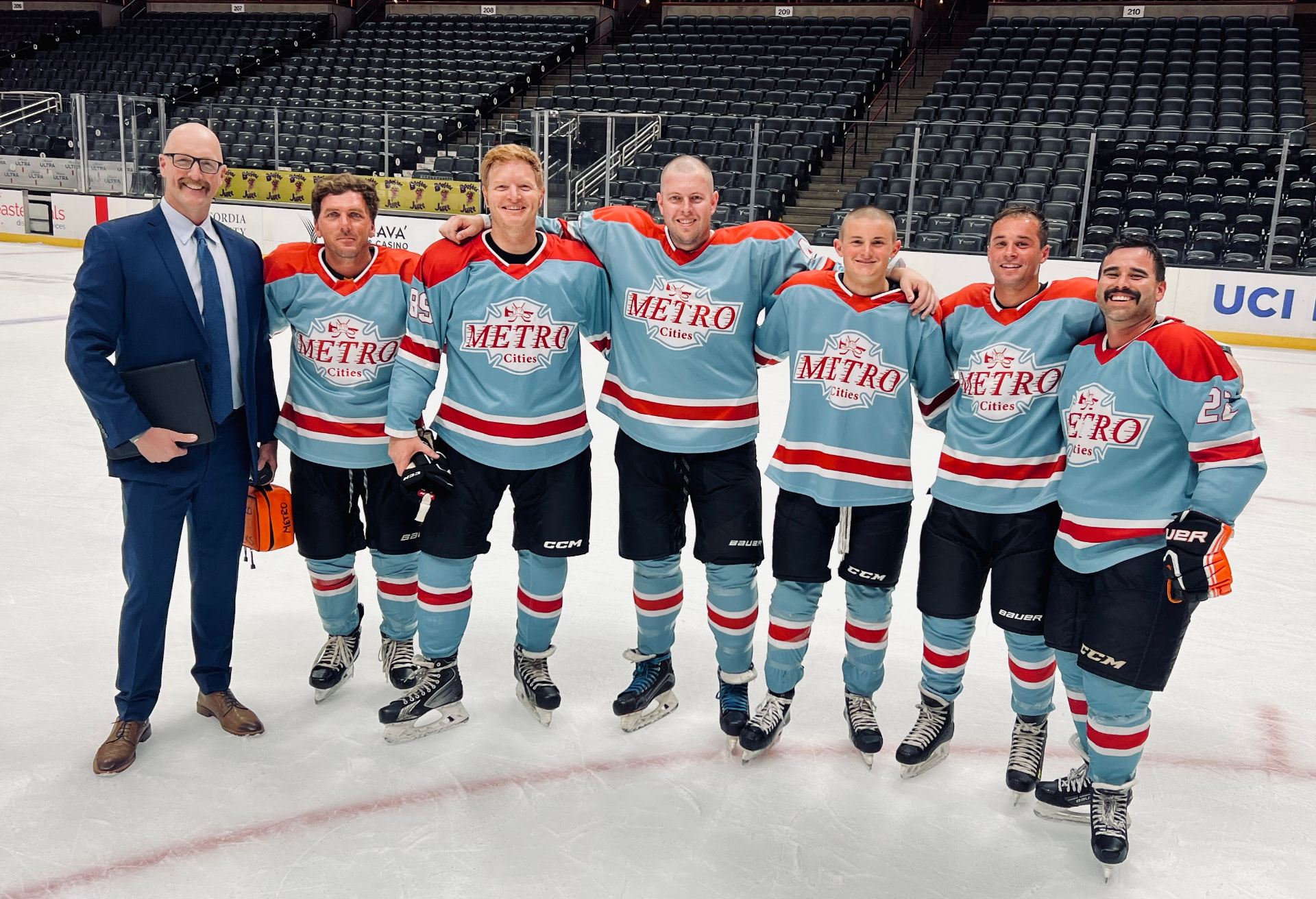 Metro Cities players lined up on the ice